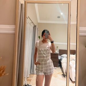 Plaid overalls with pink baby tee